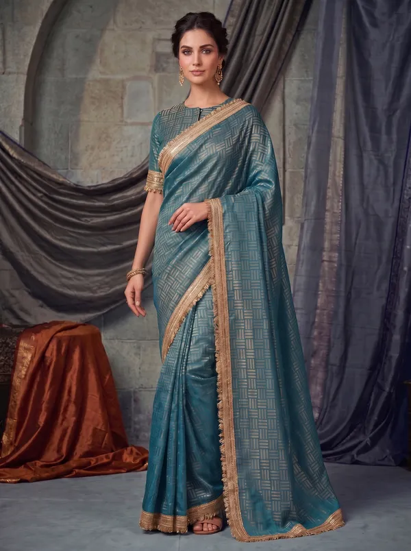 Teal_Jacquard_Satin_Tissue_Silk_Saree_with_Gold_Kiran_Fringed_Border