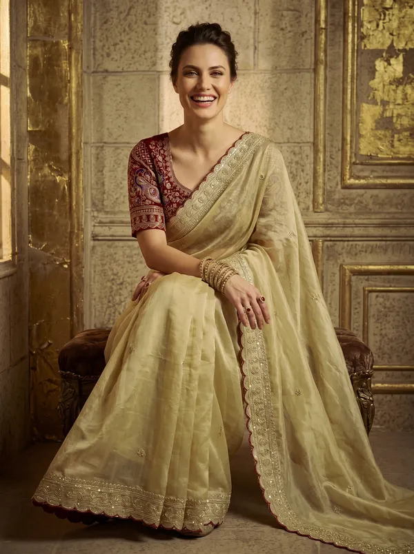 Cream_Georgette_Saree_with_Sequence_Embroidery_&_Scalloped_Border
