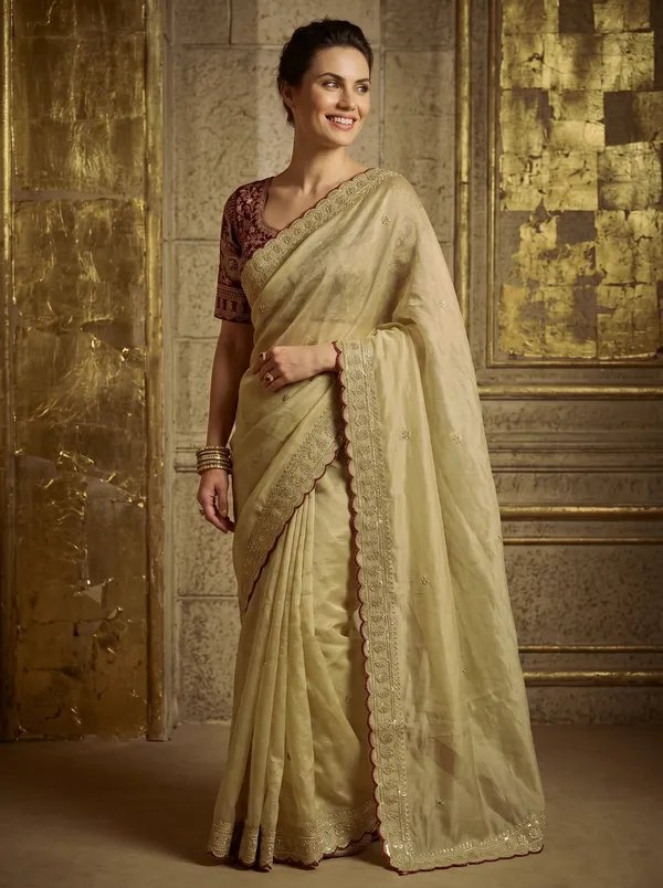 Cream_Georgette_Saree_with_Sequence_Embroidery_&_Scalloped_Border