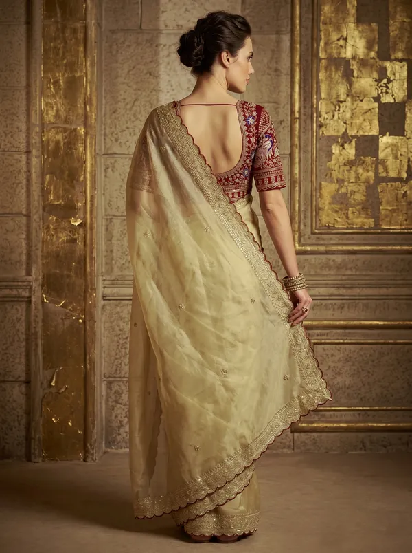 Cream_Georgette_Saree_with_Sequence_Embroidery_&_Scalloped_Border