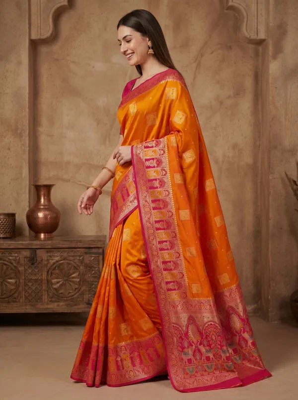 Orange_Banarasi_Silk_Saree_with_Pink_Meenakari_Border_&_Gold_Zari_Motifs