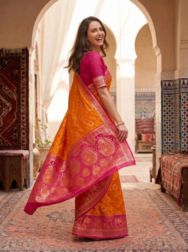 Orange_Banarasi_Silk_Saree_with_Pink_Border,_Zari_&_Meenakari_Jacquard_Weaving