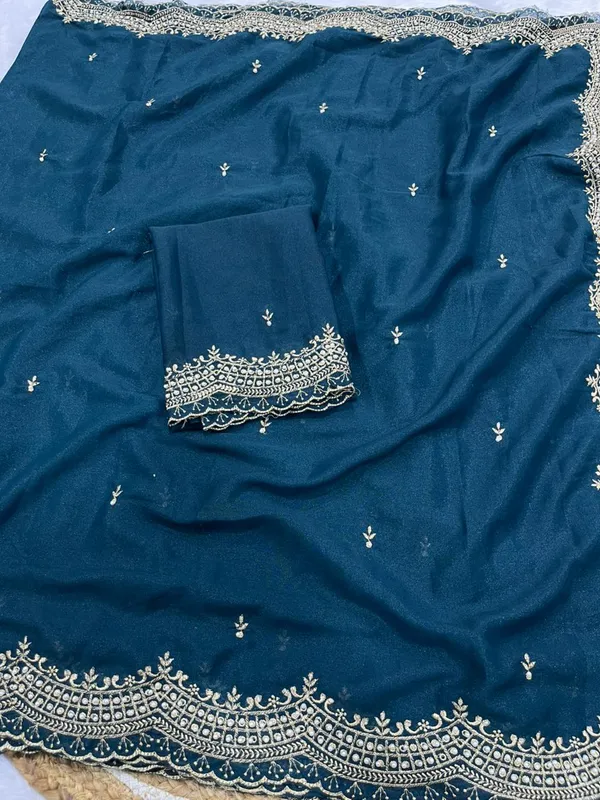Teal_Blue_Star_Georgette_Saree_With_Unstitched_Blouse_Piece_For_Women