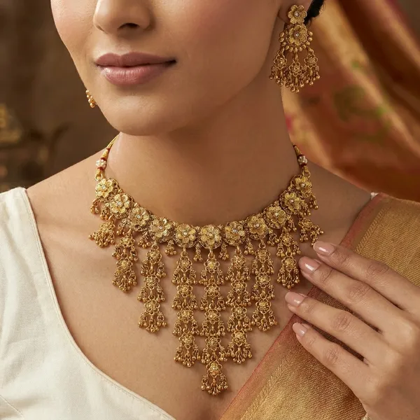 Gold_Plated_Kundan_Choker_Necklace_Set_With_Jhumka_Earrings