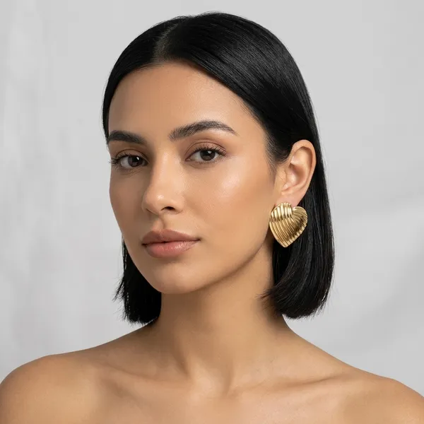 Gold_Alloy_Ribbed_Heart-Shaped_Statement_Earrings_For_Women
