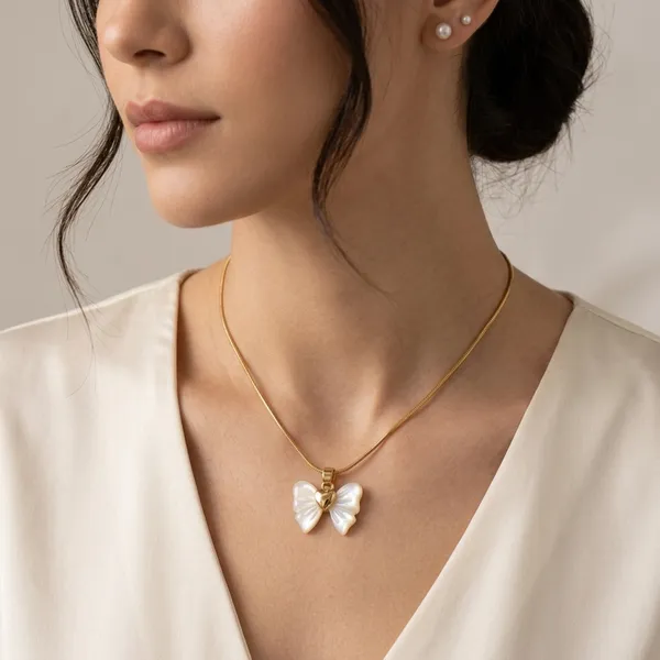 Gold_And_White_Alloy_Mother_Of_Pearl_Butterfly_Pendant_Necklace_For_Women