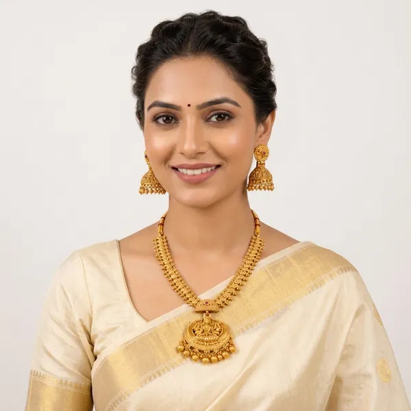 Gold_Alloy_Temple_Lakshmi_Pendant_Necklace_Set_With_Jhumka_For_Women