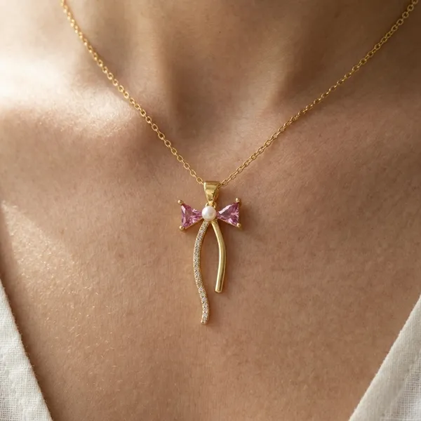 Pink_And_Gold_Alloy_Crystal_Bow_Pendant_Necklace_For_Women