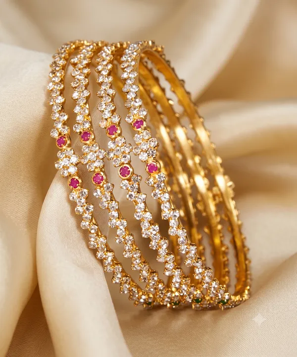 Elegant_Gold_Tone_Brass_Bangles_With_White_Stones_And_Ruby_Accents_Set_Of_4
