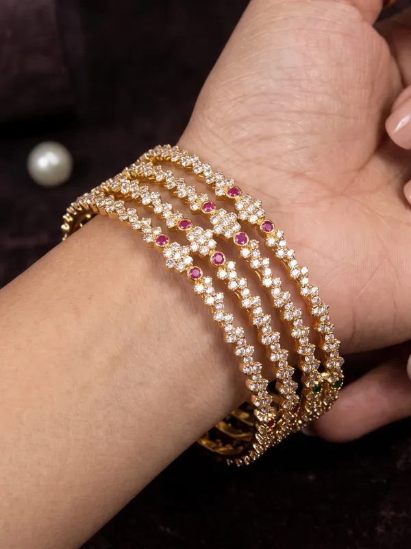 Elegant_Gold_Tone_Brass_Bangles_With_White_Stones_And_Ruby_Accents_Set_Of_4
