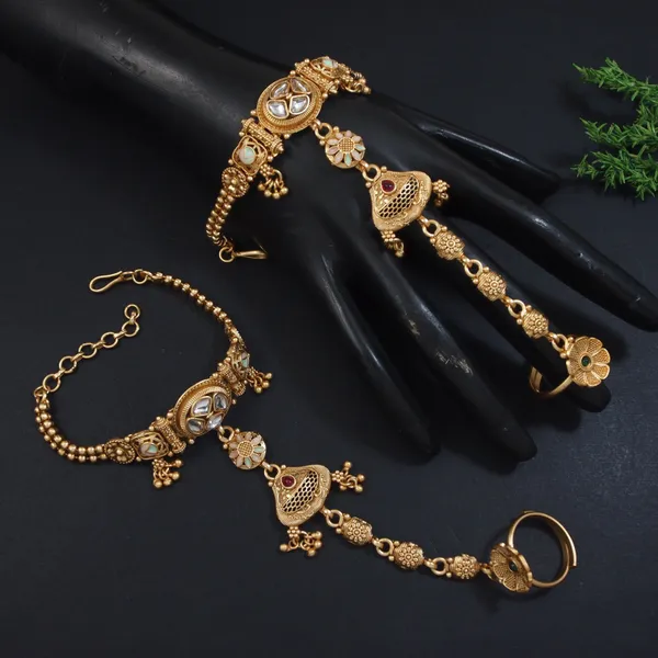Antique_Gold_Plated_Kundan_Hathphool_With_Floral_&_Jhumka_Detailing