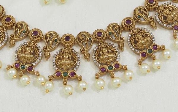 Antique_Gold_Plated_Temple_Necklace_Set_With_Lakshmi_Motif_And_Earrings