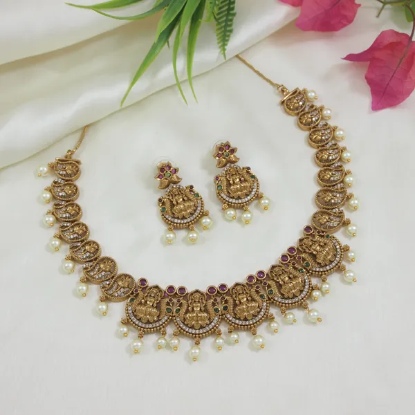 Antique_Gold_Plated_Temple_Necklace_Set_With_Lakshmi_Motif_And_Earrings