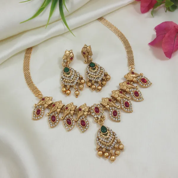 Elegant_Gold_Toned_Peacock_Necklace_Set_With_Red_&_Green_Stones