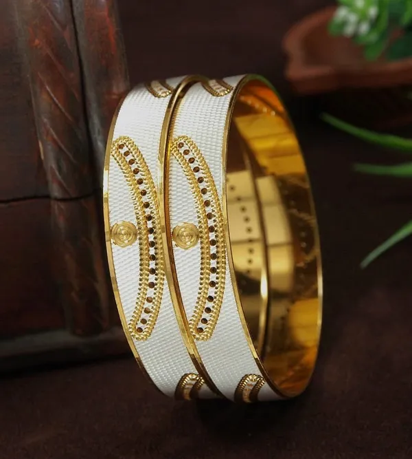 Elegant_White_And_Gold_Plated_Designer_Bangles_With_Queen_Cutout