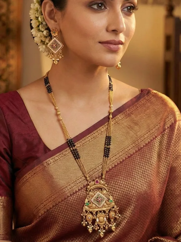 Ethnic_Designer_Gold_Plated_Black_Bead_Mangalsutra_Set_With_Ruby_&_Emerald_Coloured_Stones