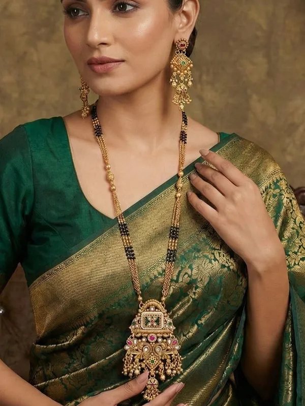 Ethnic_Designer_Gold_Plated_Black_Bead_Mangalsutra_Set_With_Ruby_&_Emerald_Coloured_Stones