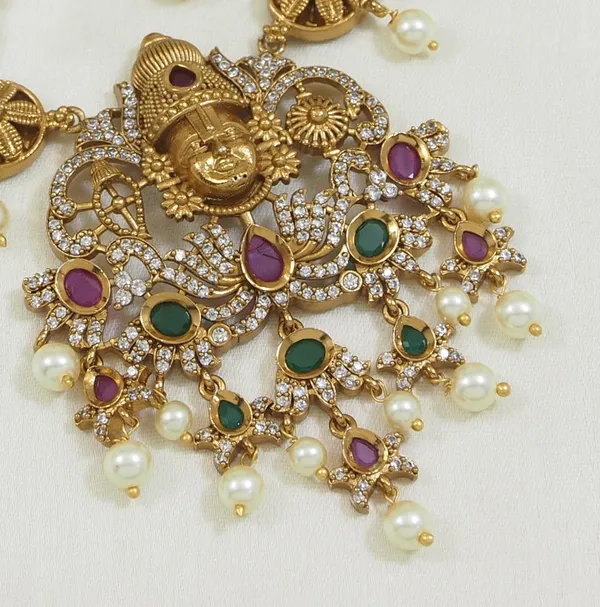 Matte_Finish_Brass_Necklace_Set_With_Lakshmi_Pendant,_American_Diamonds_&_Pearls