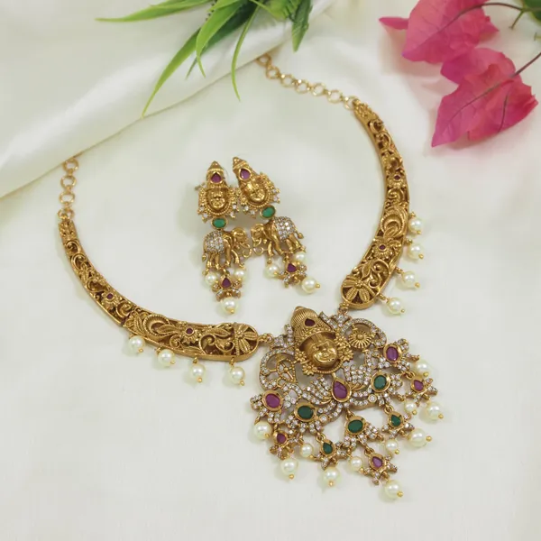 Matte_Finish_Brass_Necklace_Set_With_Lakshmi_Pendant,_American_Diamonds_&_Pearls