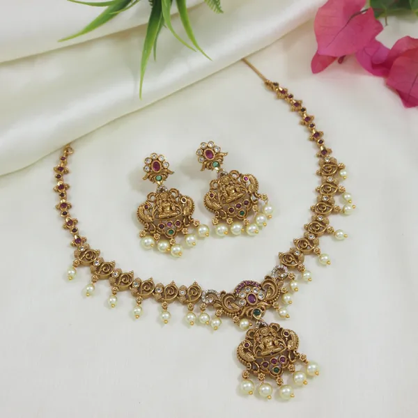 Matte_Finish_Brass_Necklace_Set_With_Lakshmi_Pendant,_American_Diamonds_&_Pearls