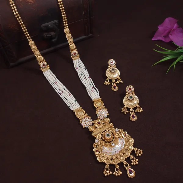 Royal_Gold_Toned_Long_Brass_Necklace_Set_With_Pearl_Beads_And_Kundan_Embellishments
