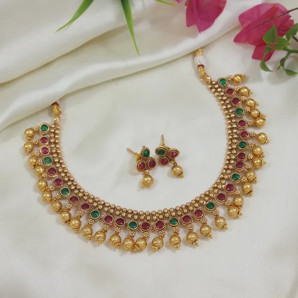 Traditional_Gold_Plated_Necklace_Set_With_Green_And_Red_Stone_Embellishments_&_Matching_Earrings