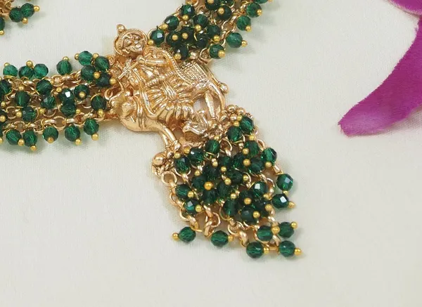 Traditional_Gold_Plated_Radha_Krishna_Necklace_Set_With_Pearl_Accents_And_Matching_Earrings