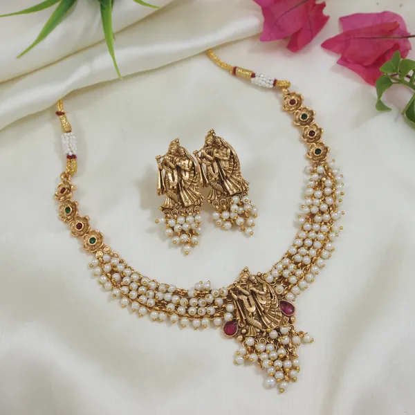 Traditional_Gold_Plated_Radha_Krishna_Necklace_Set_With_Pearl_Accents_And_Matching_Earrings