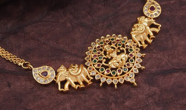 Traditional_Lakshmi_Pendant_Necklace_Set_With_Jhumka_Earrings_Gold_Tone_Bridal_Jewelry