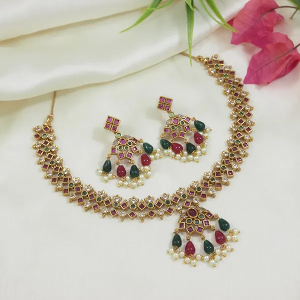 Traditional_Ruby_And_Emerald_Kundan_Necklace_Set_With_Earrings