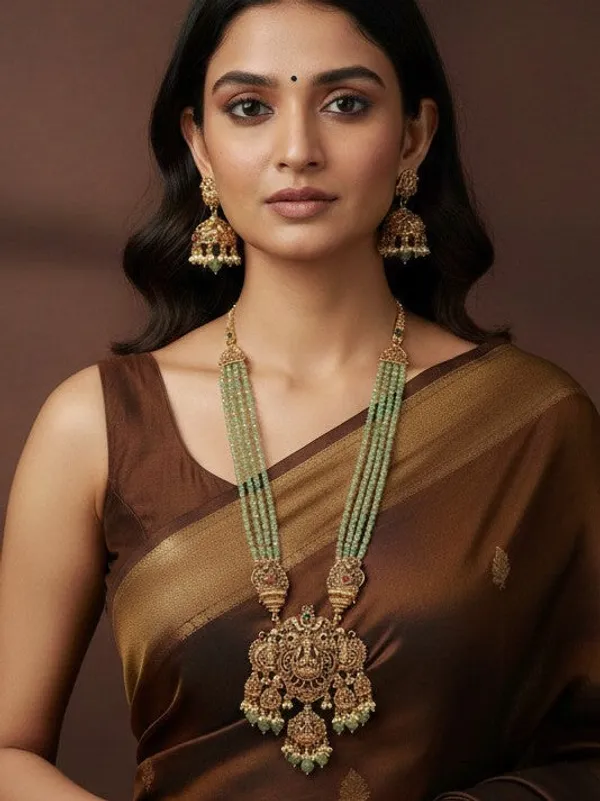 Antique_Gold_Temple_Necklace_Set_With_Lakshmi_Pendant_And_Mint_Beads