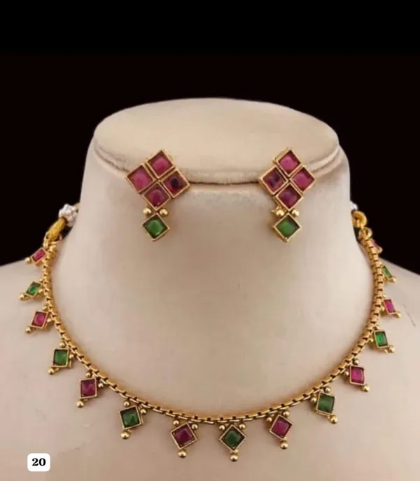 Gold_Necklace_&_Earrings_With_Ruby-Emerald_Stones_