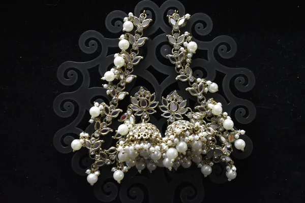 Silver_And_White_Alloy_Mirror_Pearl_Lotus_Jhumkas_With_Hair_Chain_For_Women