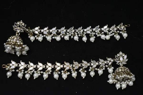 Silver_And_White_Alloy_Mirror_Pearl_Lotus_Jhumkas_With_Hair_Chain_For_Women