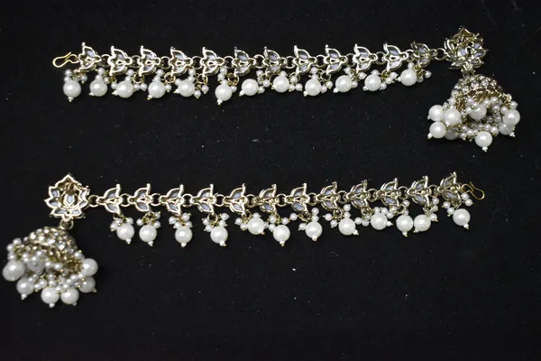 Silver_And_White_Alloy_Mirror_Pearl_Lotus_Jhumkas_With_Hair_Chain_For_Women