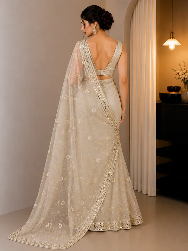 Ivory_Soft_Net_Floral_Embroidered_Sequin_Work_Saree_For_Women