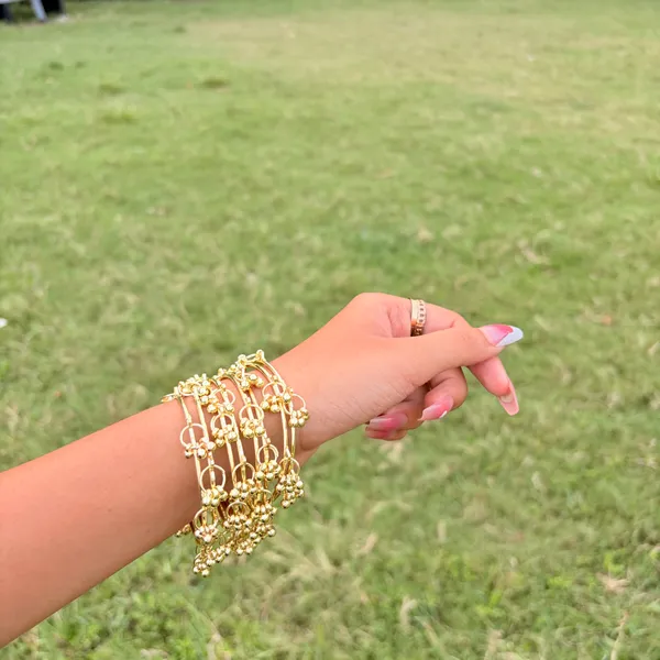 Golden_Alloy_Metal_Festive_Bangles_Set_For_Women_(Pack_Of_2)