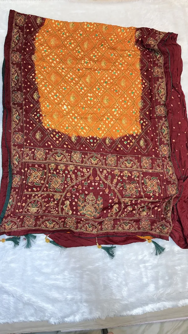 Maroon_And_Orange_Bandhani_Saree_With_Embroidered_Border