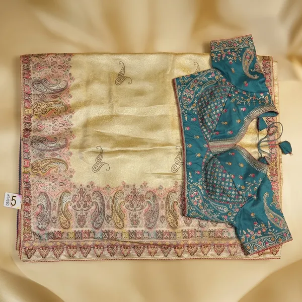 Cream_Paisley_Border_Silk_Saree_With_Teal_Embroidered_Blouse