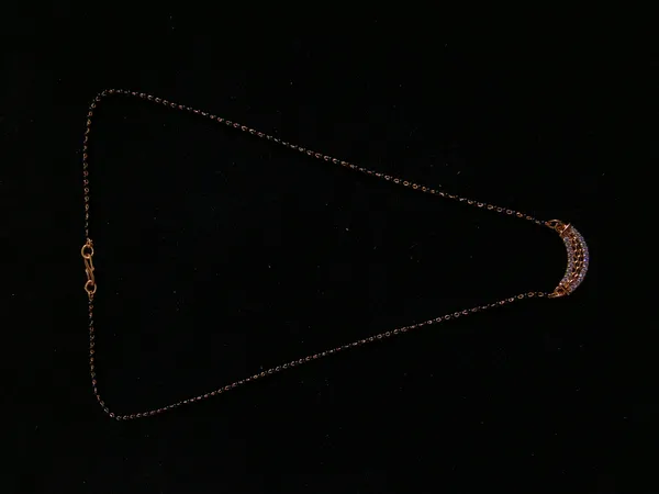 Aarsa_Premium_Rose_Gold_Finish_Curved_Crescent_Honeycomb_
__Openwork_Cz_Mangalsutra_For_Women_|_Elegant_Black_Bead_
__Traditional_Jewellery