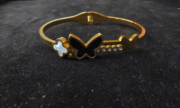 Aarsa_Premium_Micro_Gold_Plated_Black_Butterfly_Clover_Crystal_
__Open_Cuff_Bracelet_For_Women_And_Girls_|_Luxury_Contemporary_
__Jewellery