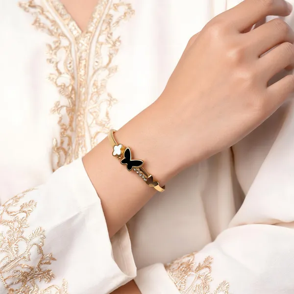 Aarsa_Premium_Micro_Gold_Plated_Black_Butterfly_Clover_Crystal_
__Open_Cuff_Bracelet_For_Women_And_Girls_|_Luxury_Contemporary_
__Jewellery