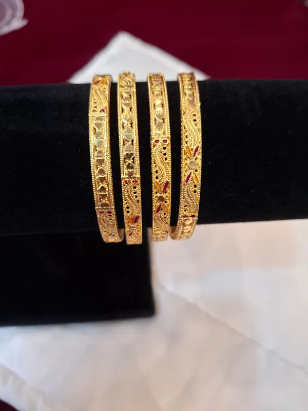 Gold_Metal_Floral_Engraved_Thin_Bangles_Set_Of_4_For_Women