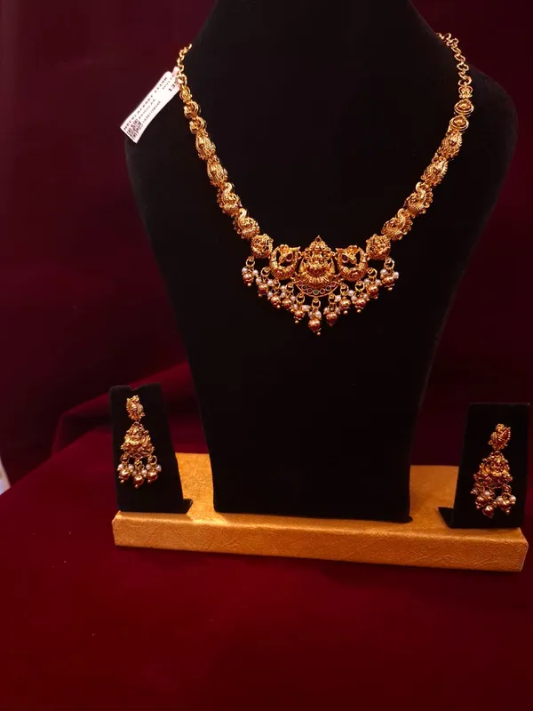 Antique_Gold_Metal_Temple_Lakshmi_Necklace_Set_With_Earrings_For_Women