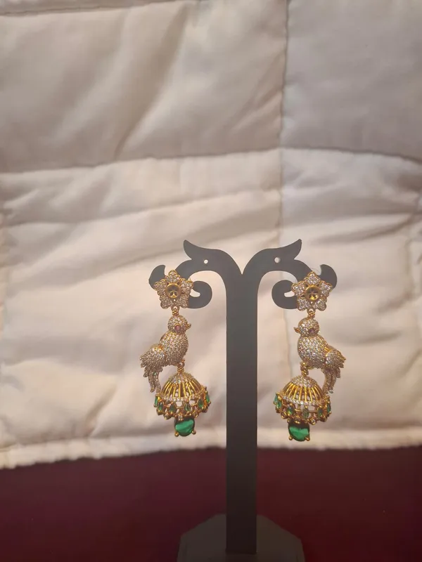 Gold_And_Green_Metal_Peacock_Jhumka_Earrings_For_Women