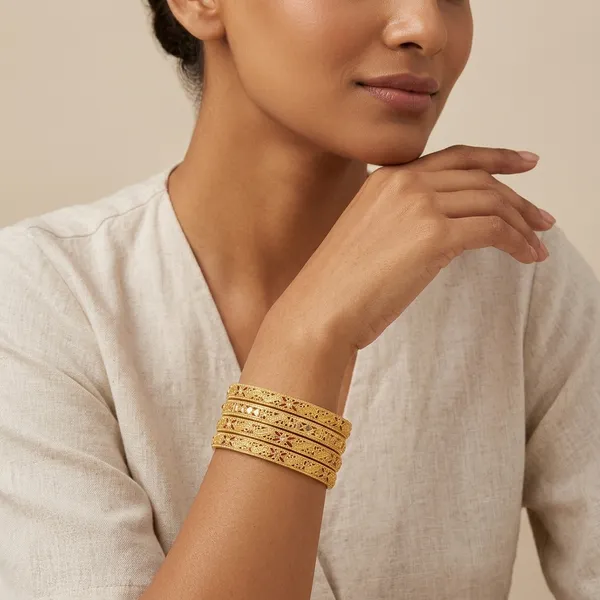 Gold_Metal_Floral_Engraved_Thin_Bangles_Set_Of_4_For_Women