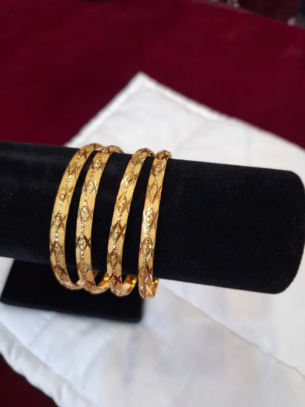Gold_Metal_Textured_Bangles_Set_Of_4_For_Women