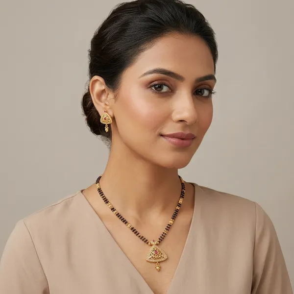 Gold_Metal_Triangular_Cutwork_Pendant_Necklace_Set_For_Women