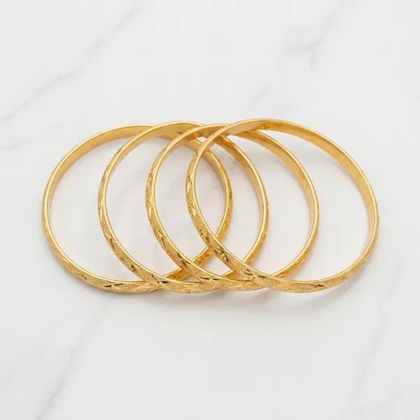 Gold_Metal_Textured_Bangles_Set_Of_4_For_Women