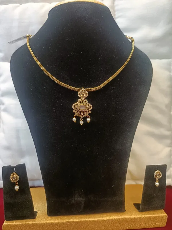 Antique_Gold_Pearl_Metal_Kundan_Necklace_Set_With_Pearl_Drops_For_Women